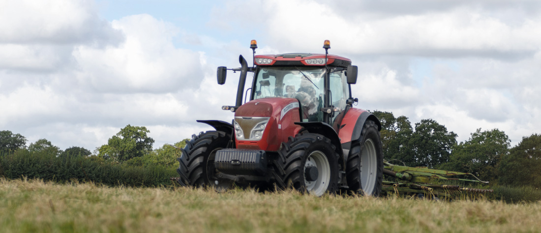Tractor in a field with Goodyear Farm Tires